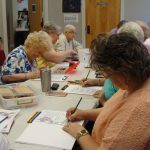 Group of ladies coloring.