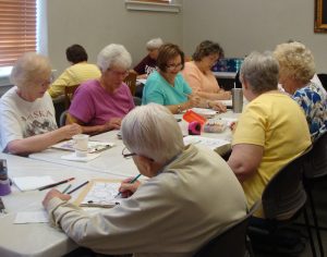 Group of ladies coloring.